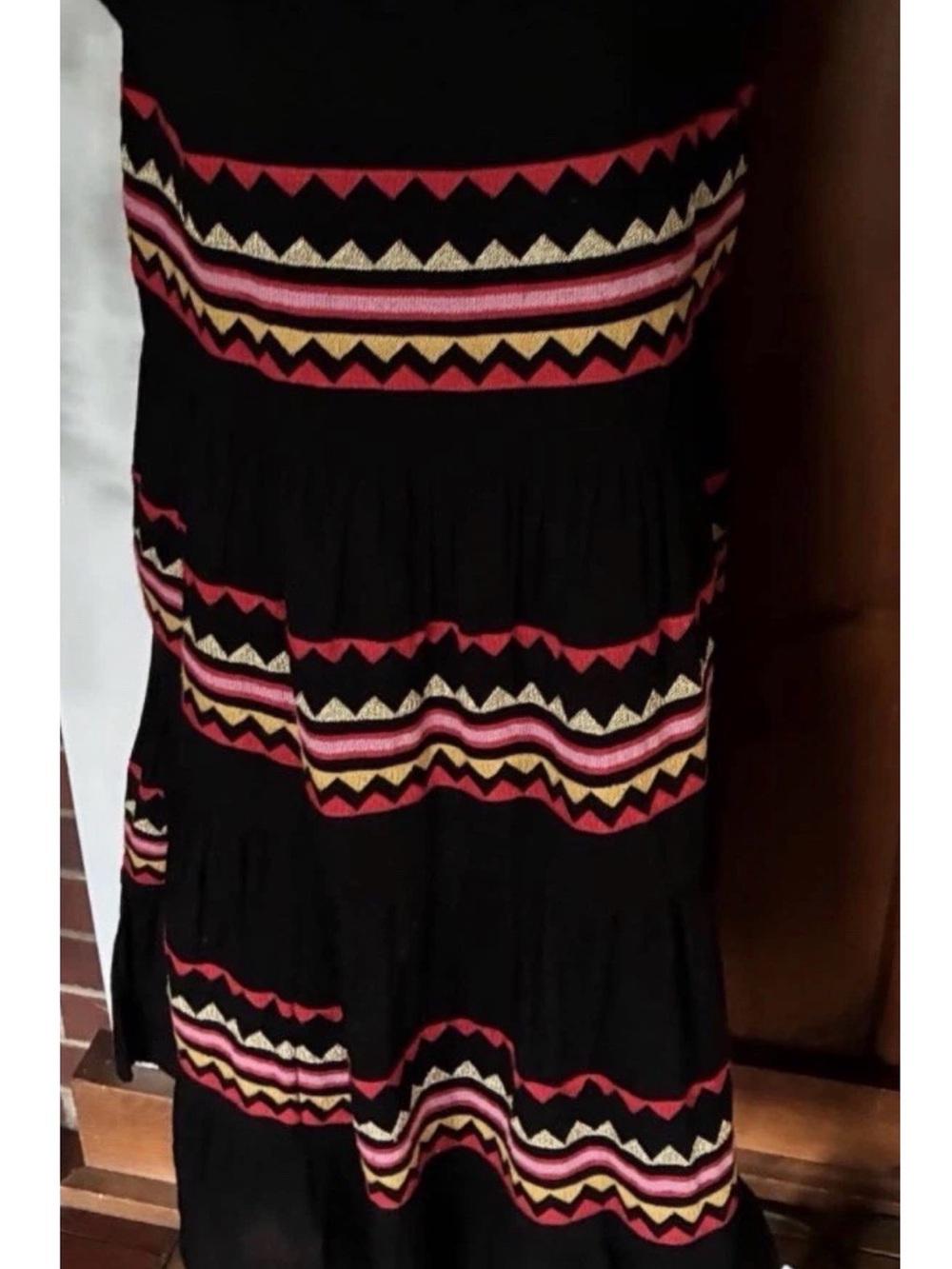 A Classy Chic Boutique Black Dress with Pink Gold and Red Trim